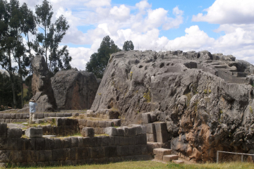 Ancient Inca rock formations and ceremonial terraces at Qenqo, an important archaeological site near Cusco, used for rituals and astronomy - Kenko Adventures